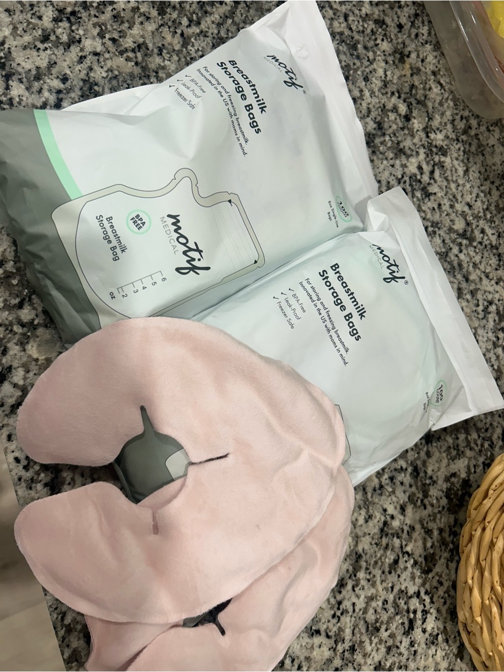 Motif breast milk storage bags and Frida Nursing Support ice/heat pack